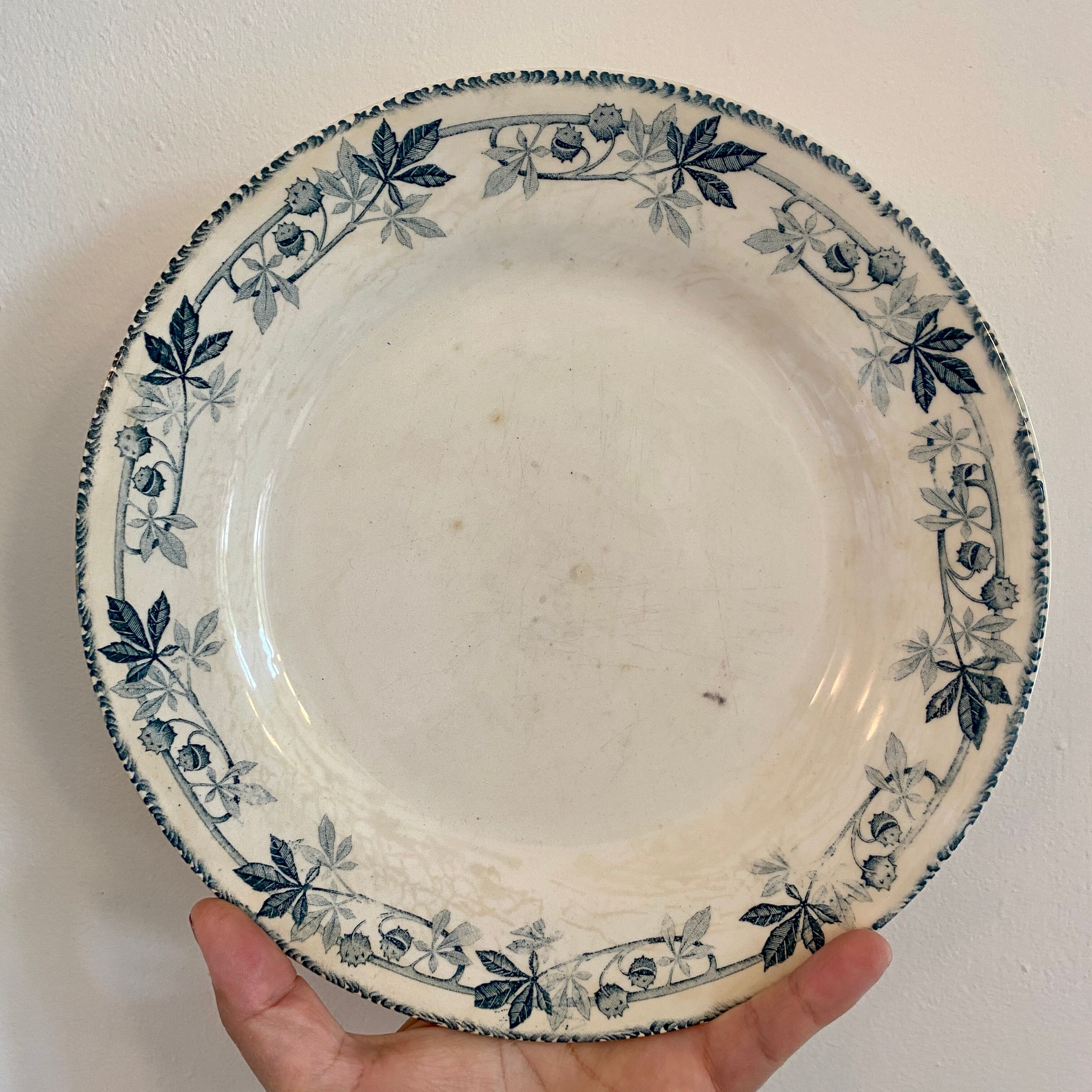 Set of 6 mismatched old iron earth flat plates