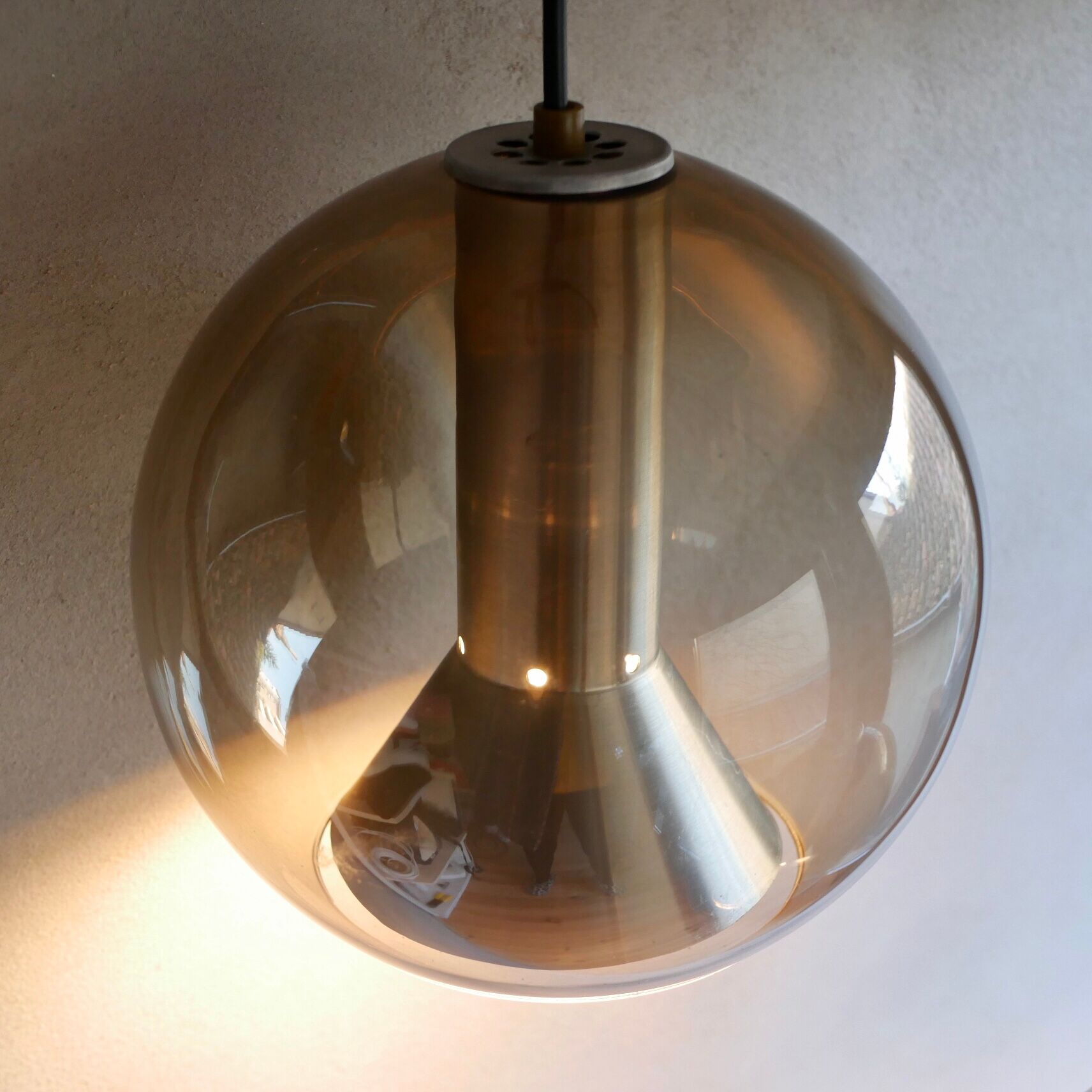 Pair of raak Amsterdam globe suspensions