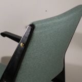 Vintage armchair from the 1960s in black wood and fabric.