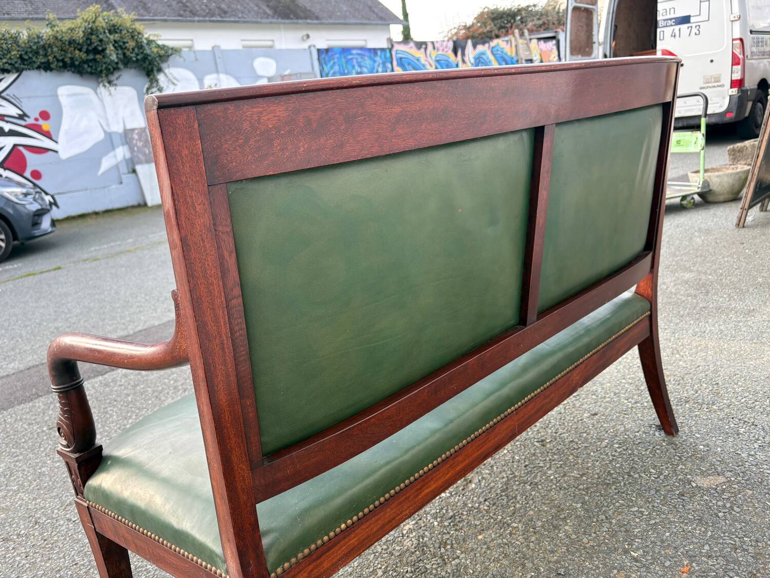 Empire style bench in mahogany and green leather