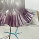 Antique tulip lampshade in transparent glass with a purple rim.