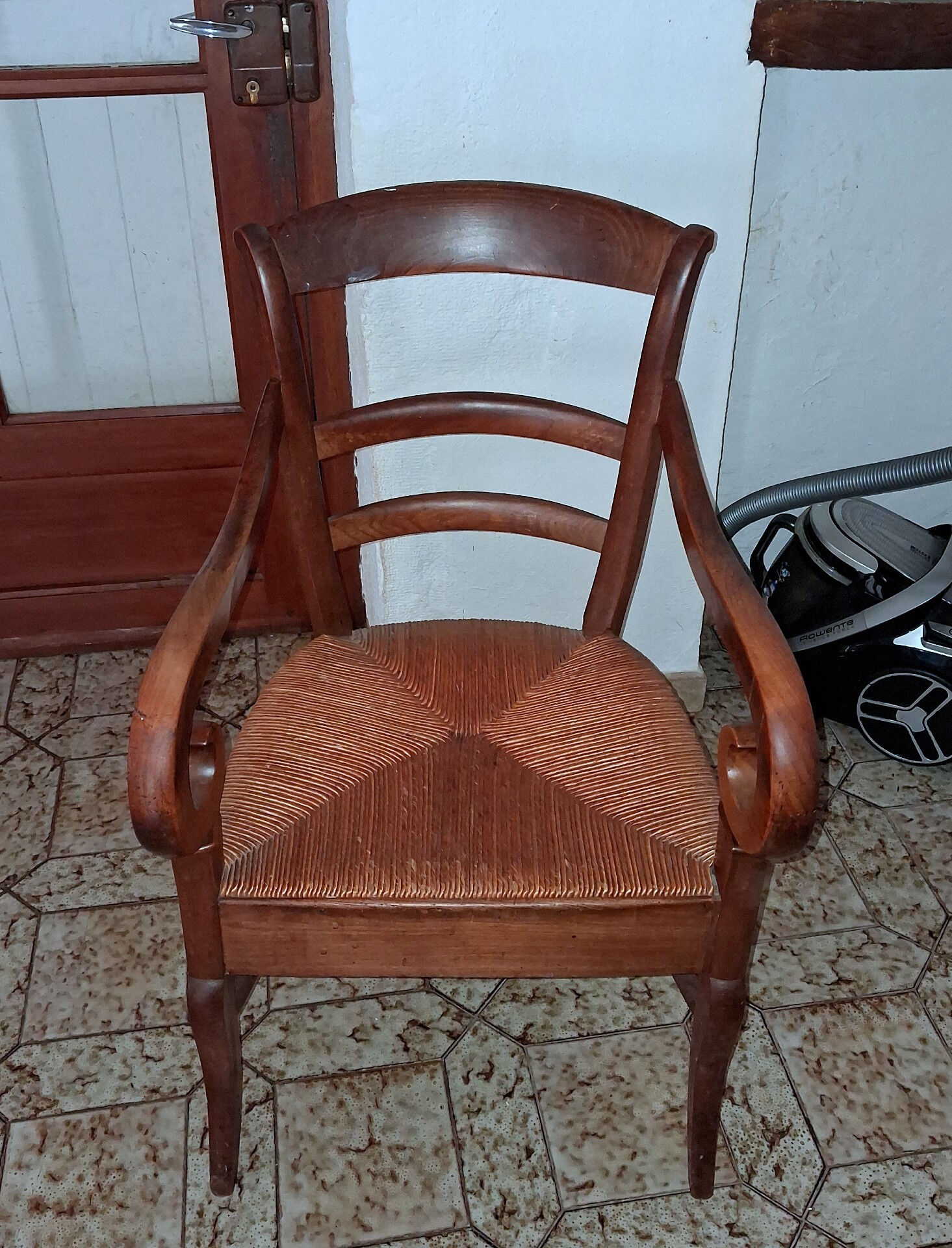 Empire armchair in solid walnut, early 19th century