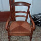 Empire armchair in solid walnut, early 19th century