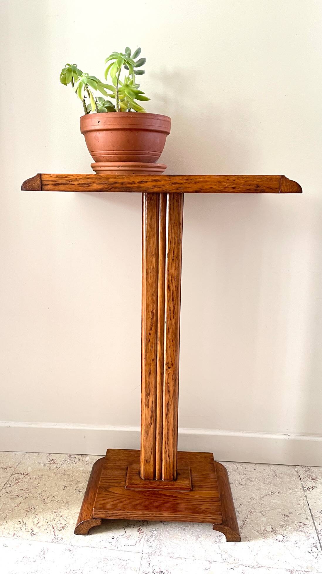 Vintage solid oak saddle plant holder