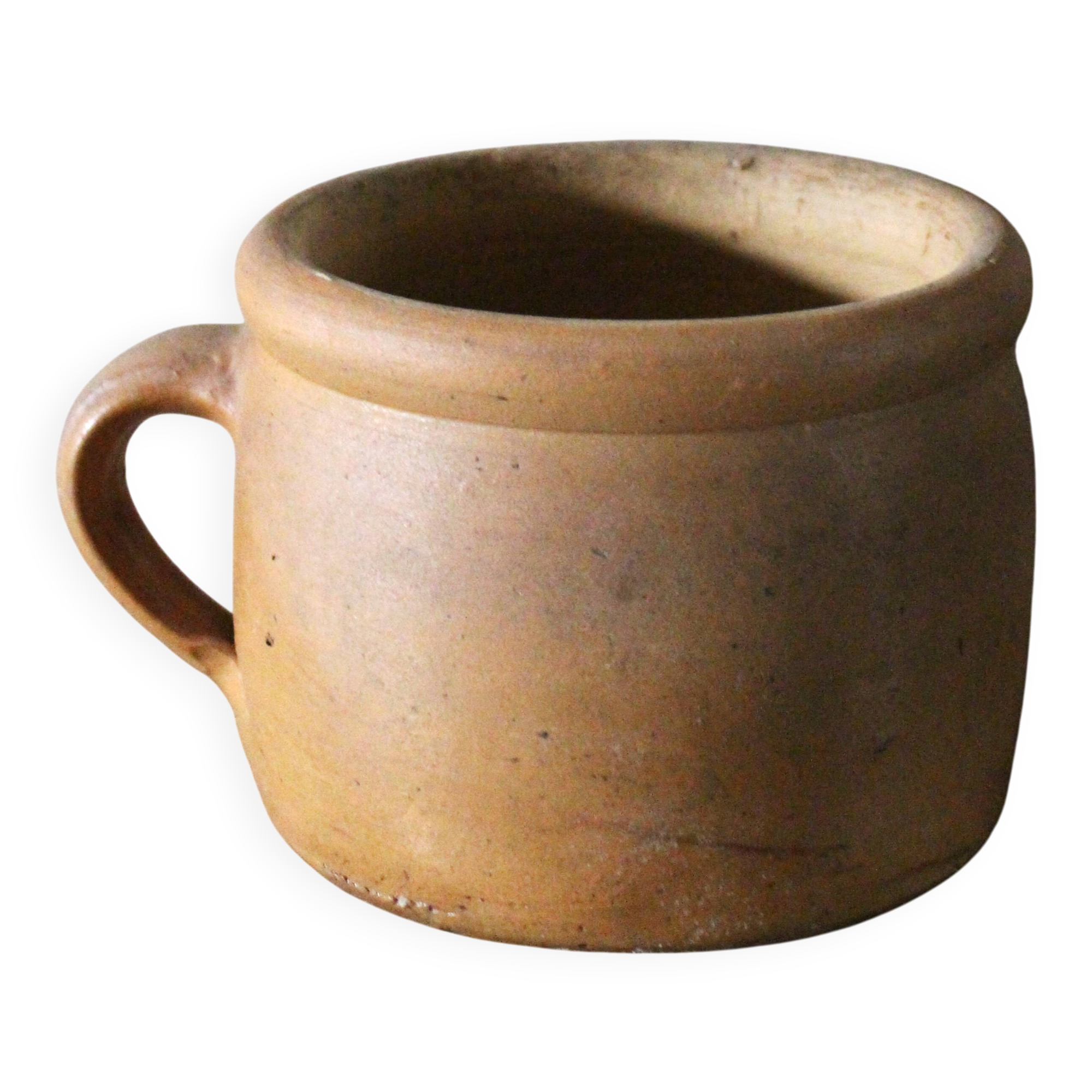 Round terracotta milk jug with handle
