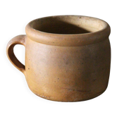 Round terracotta milk jug with handle
