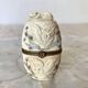 Ivory and brass owl and ermine box