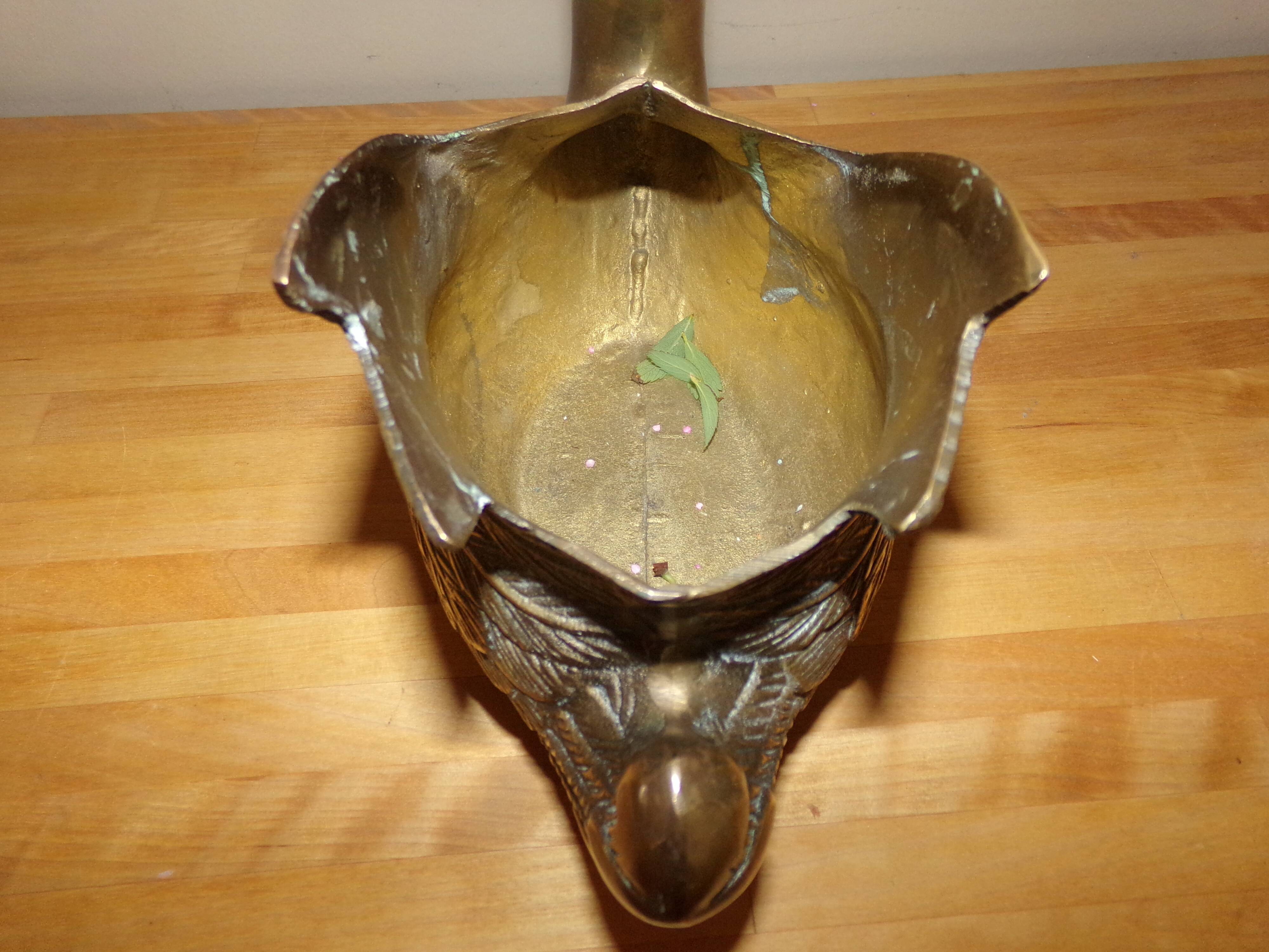 Old cylon-shaped pot cover