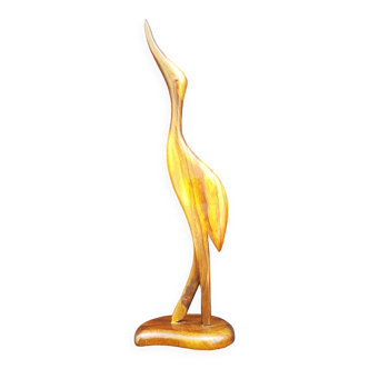 Wooden wading bird sculpture