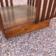 Revolving cherry bookcase