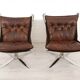 2 chauffeuses vintage Falcon en cuir par Sigurd Ressell
