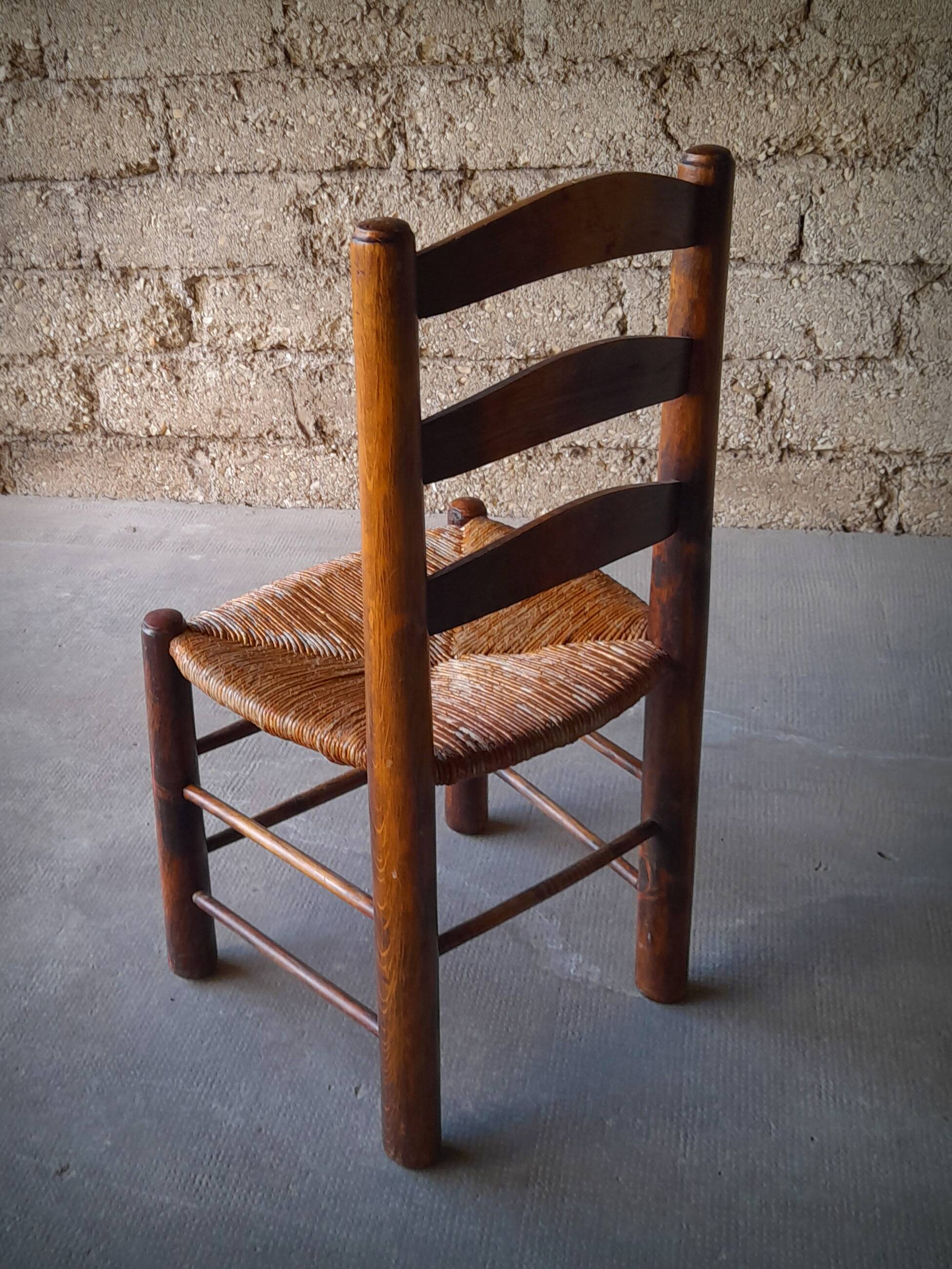 Set of 4 straw-covered brutalist chairs by George Robert