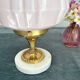 Art Deco lamp with pastel pink opaline globe.