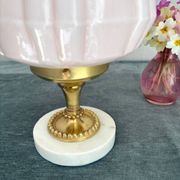 Art Deco lamp with pastel pink opaline globe.