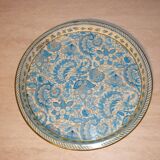 Blue cashmere round tray on white background.