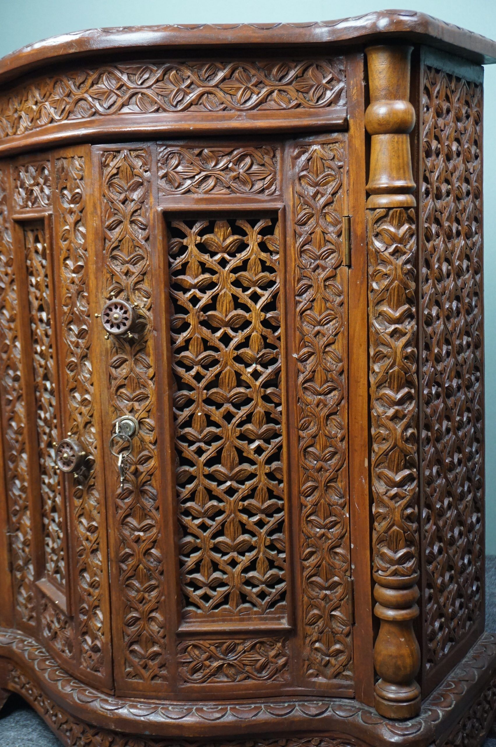 Carved wooden cabinet from the mid-20th century