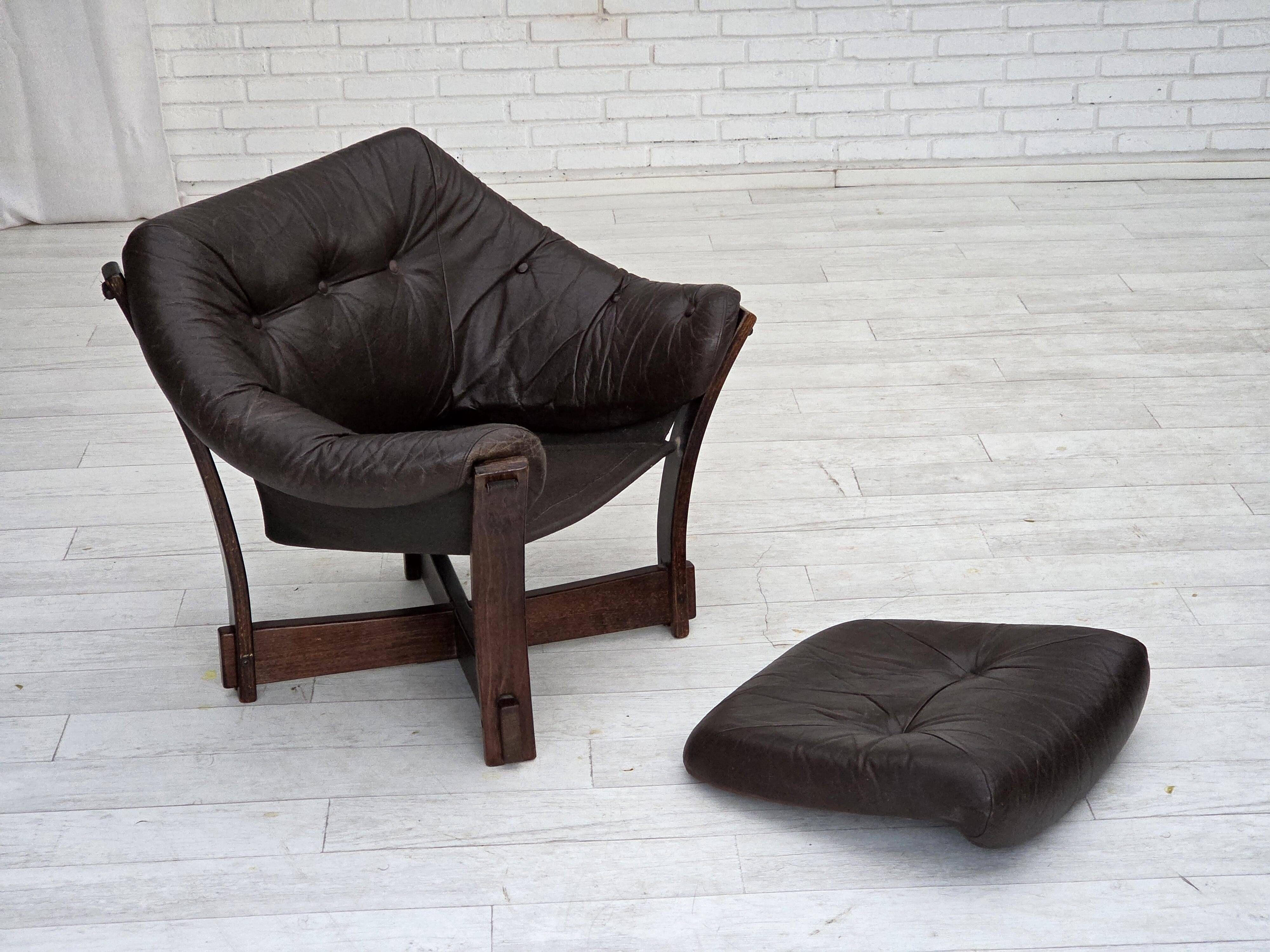 1970s, Scandinavian lounge chair, furniture leather, oak wood.