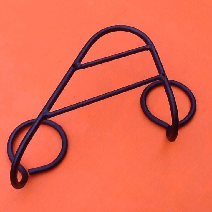 Former industrial-style wall coat rack