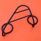 Former industrial-style wall coat rack