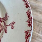 Old oval dish in iron earth