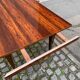Scandinavian extendable dining table in lacquered wood and rosewood, 150cm.