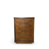 A vintage Italian chest of drawers, made of veneered walnut and solid wood,