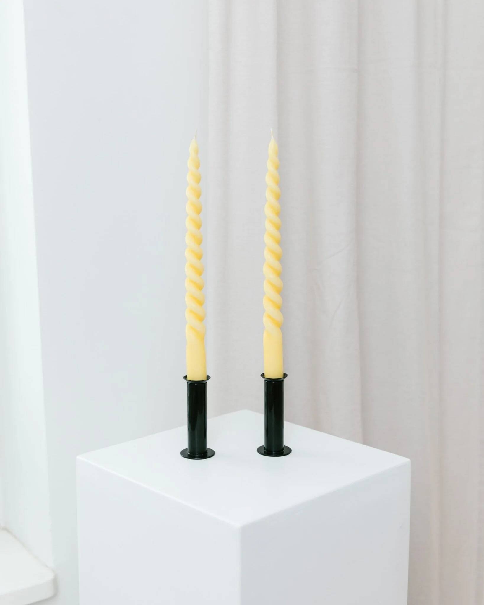 Set of 2 glossy black metal candleholders in retro Ikea Memphis style