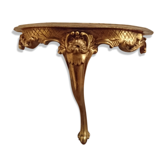 Corner console in gilded wood