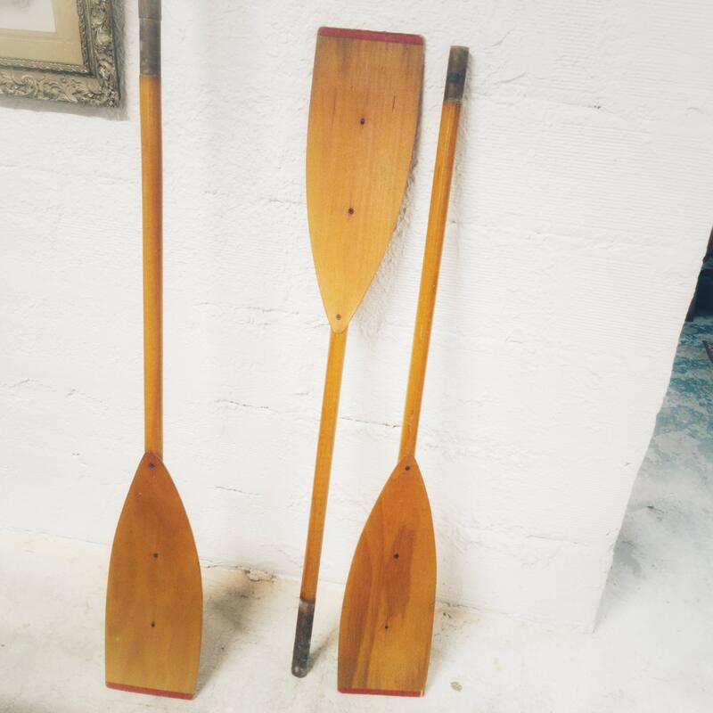 Pair of old wooden oars