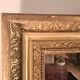 Miroir époque Restauration en bois doré à la feuille