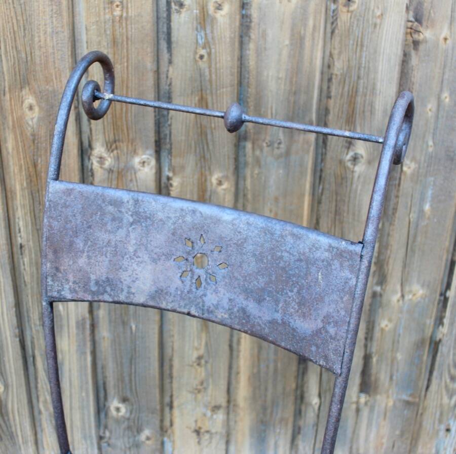 Series of 8 wrought iron garden chairs