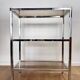 Stainless steel shelf and smoked glass