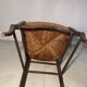 Antique Provencal armchair in carved wood with straw seat