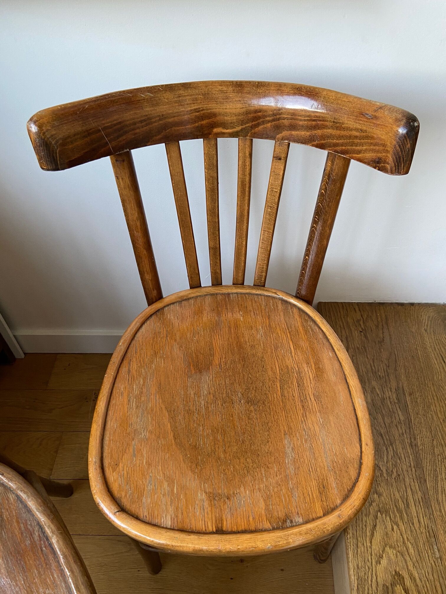 Pair of wooden bistro chairs