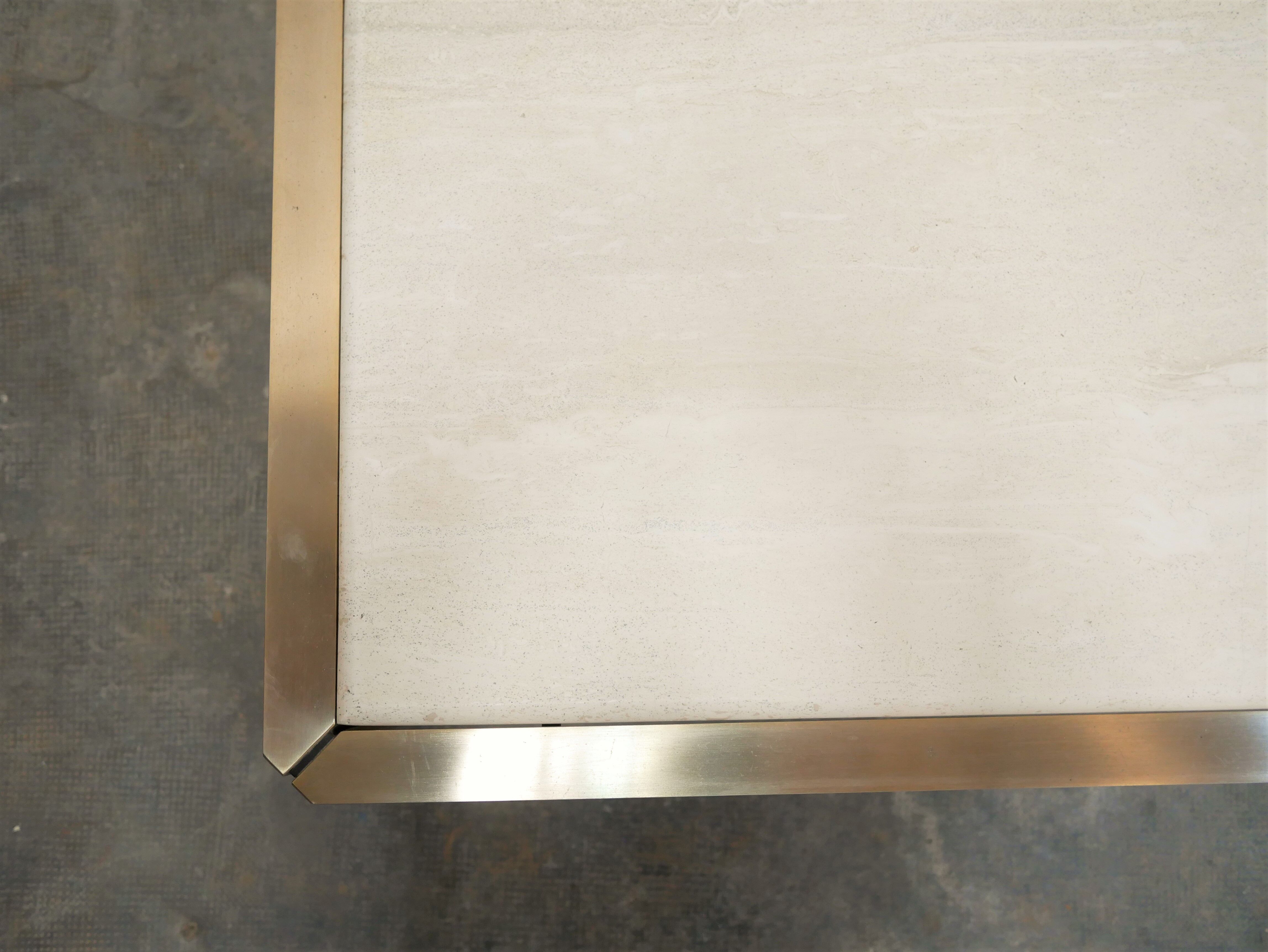 Vintage coffee table in travertine and brass