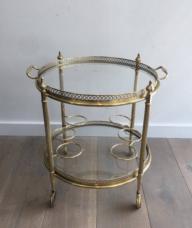 Round brass rolling table attributed to Maison Jansen