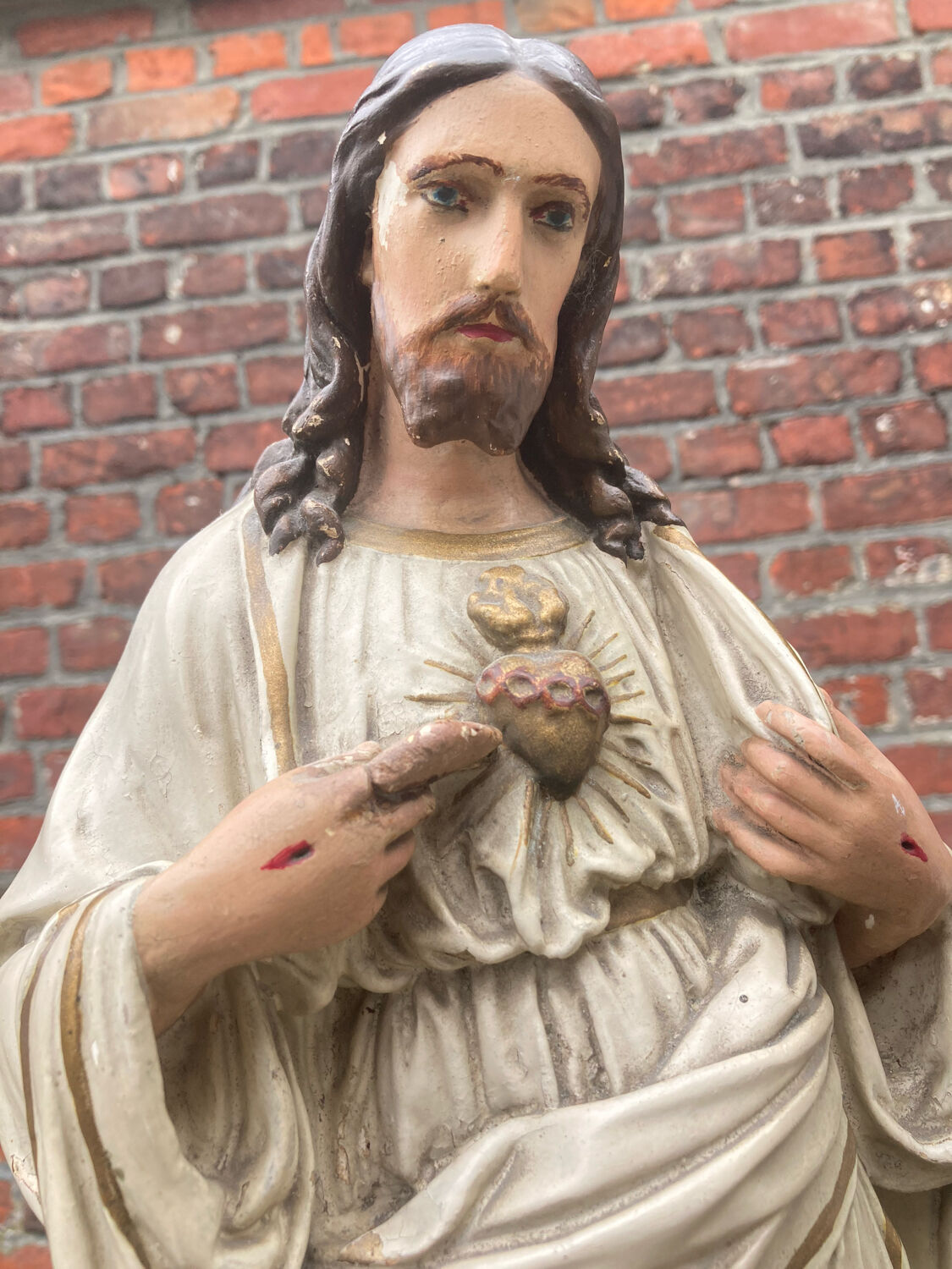 Ancient religious statue - great sacred heart