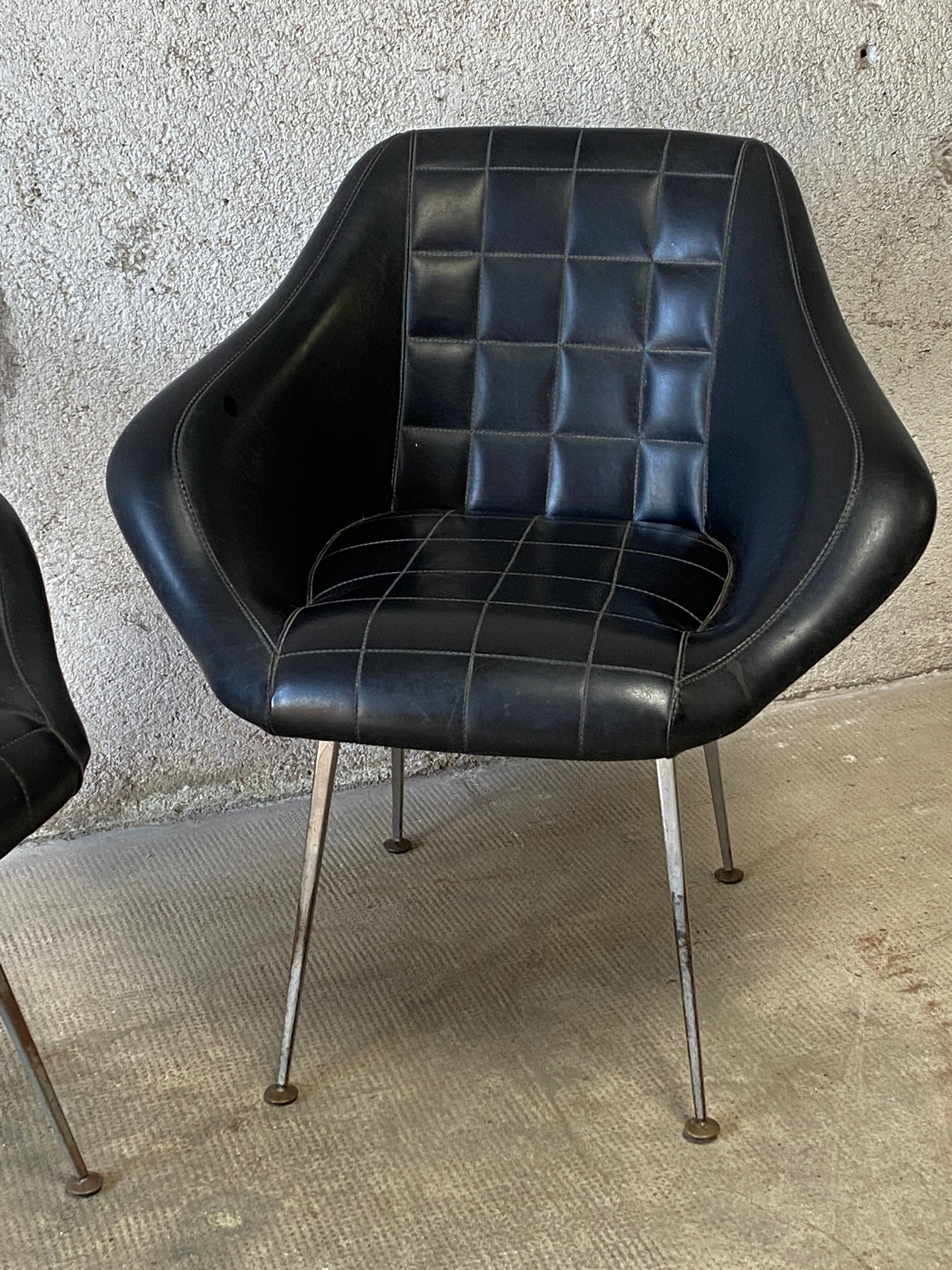 Pair of upholstered armchair year 60