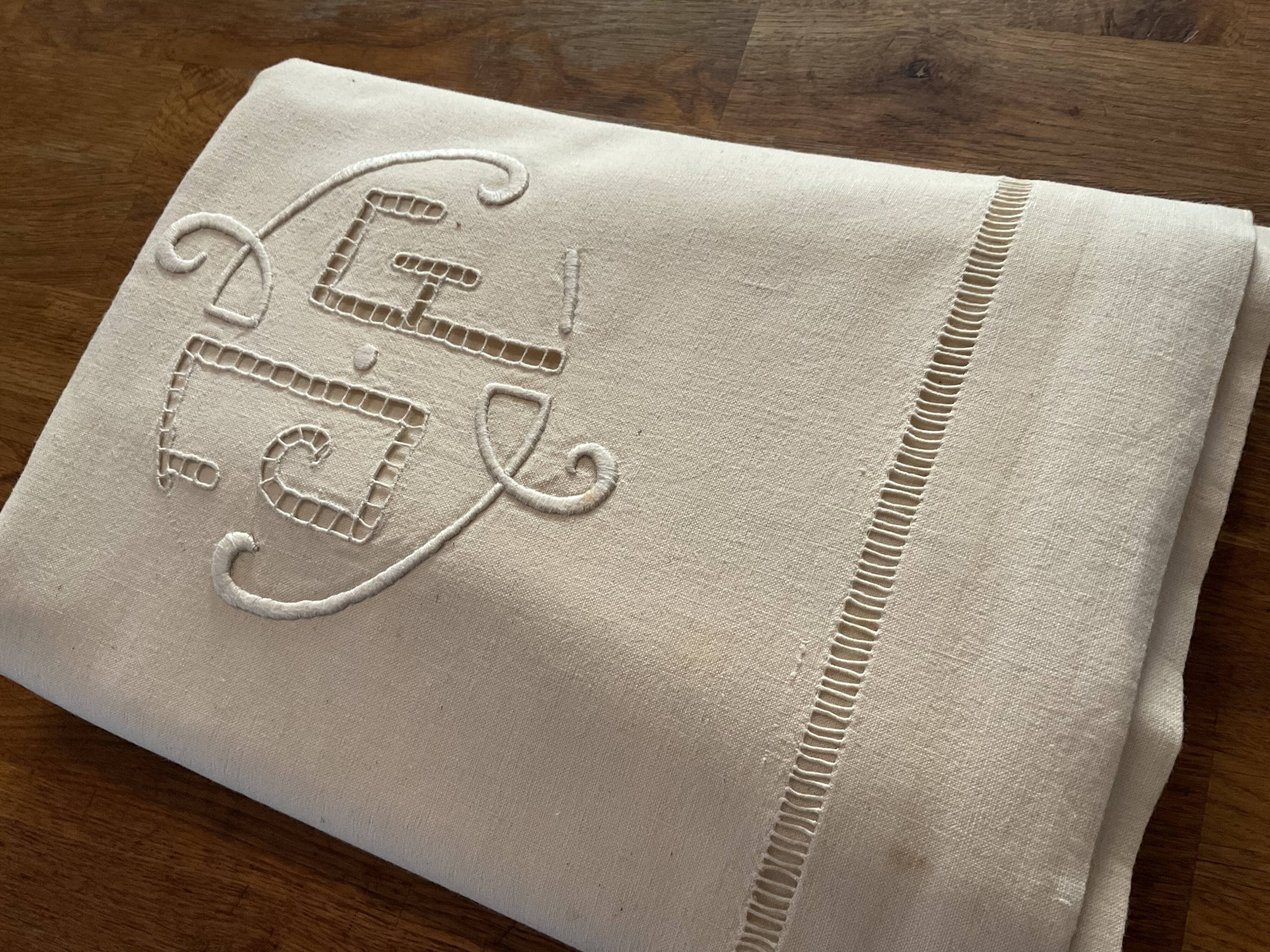 Old embroidered sheet. J F