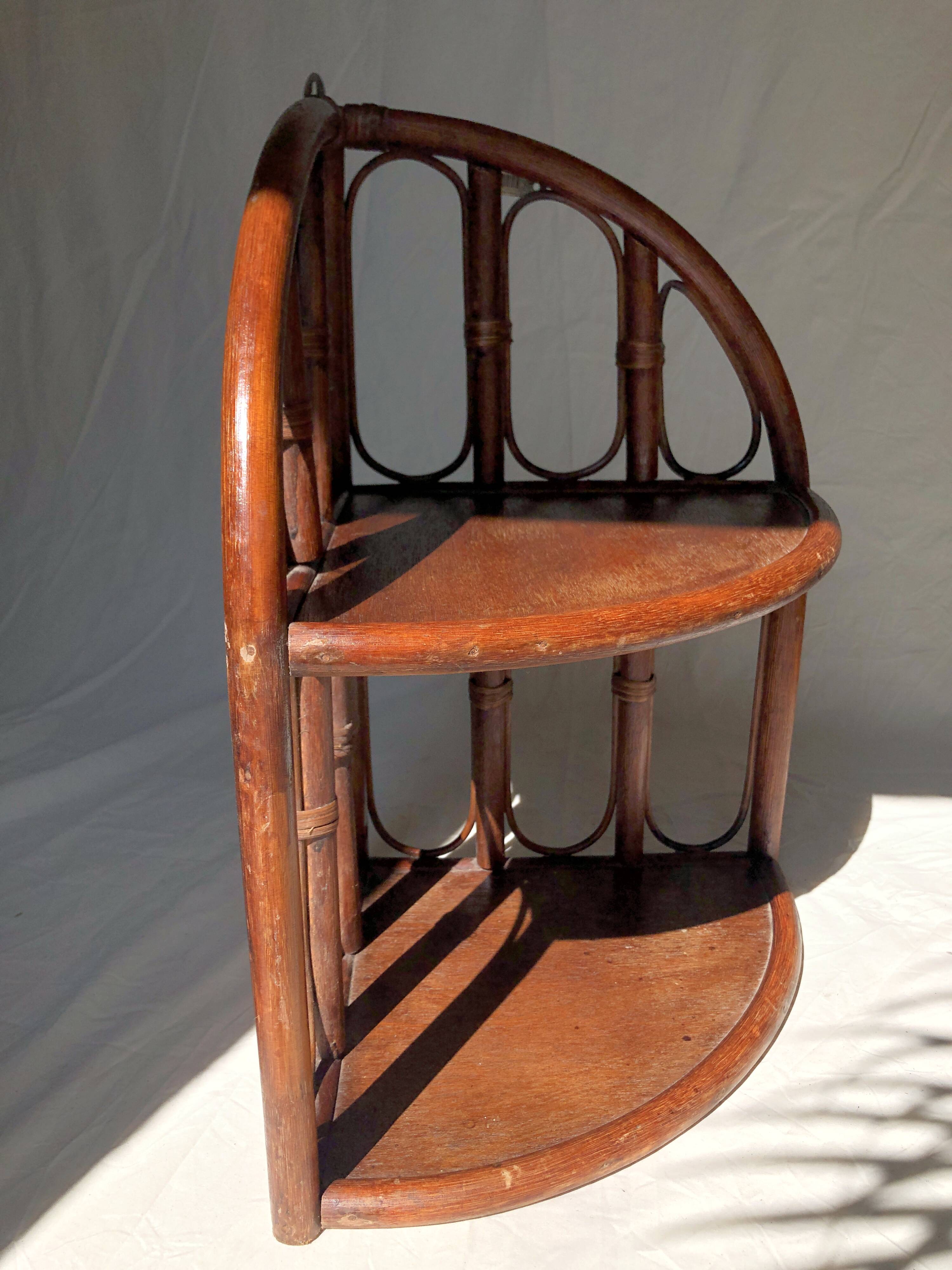 Corner shelf in dark rattan, 60s/70s
