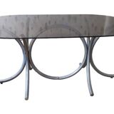 Large oval table from the 70s in smoked glass with chrome legs