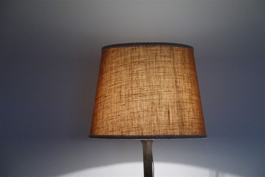 Hammered iron floor lamp in the style of Marolles