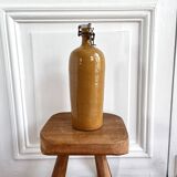 Bouteille ancienne en grès vernissé et bouchon en faÏence