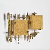 Pair of brutalist wall sconces in brass and fractal resin from the 1970s.