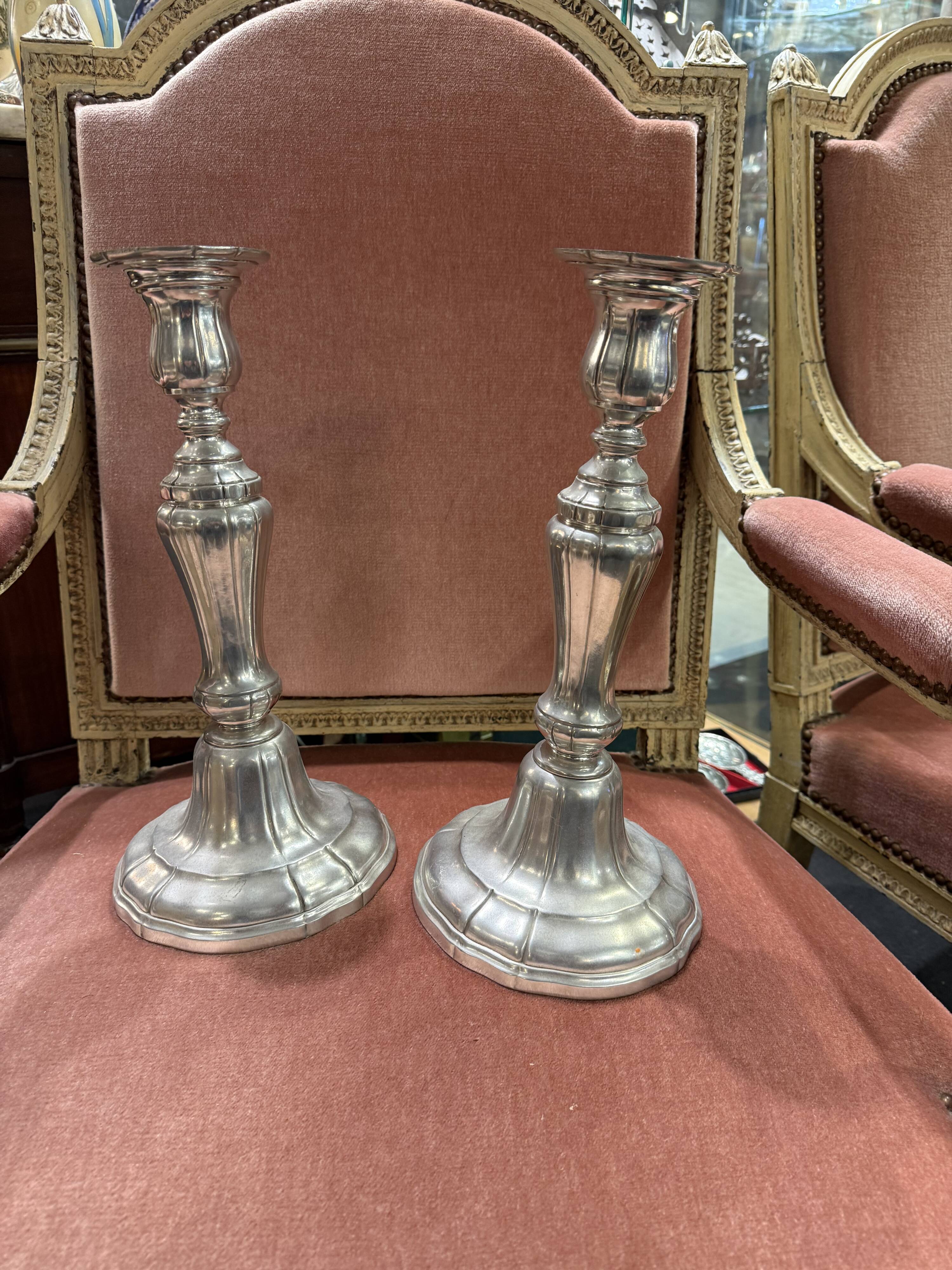 Pair of metal candlesticks