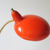 Orange flexible desk lamp