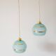 paire de suspensions boules granité bleu et doré 1950