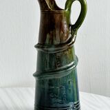 Large pitcher with frog handle.