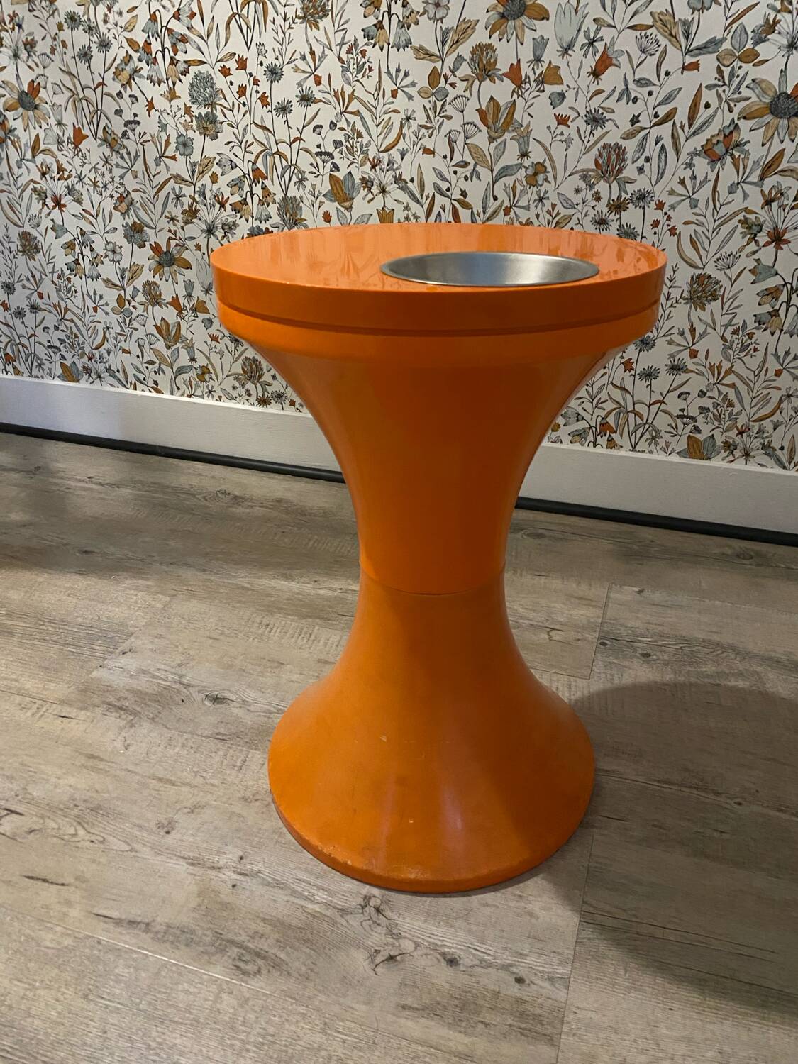 Orange tam-tam by Stamp with integrated pocket.