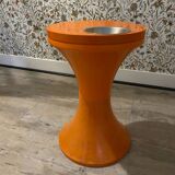 Orange tam-tam by Stamp with integrated pocket.